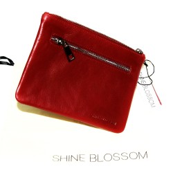 Pochette en cuir rouge...