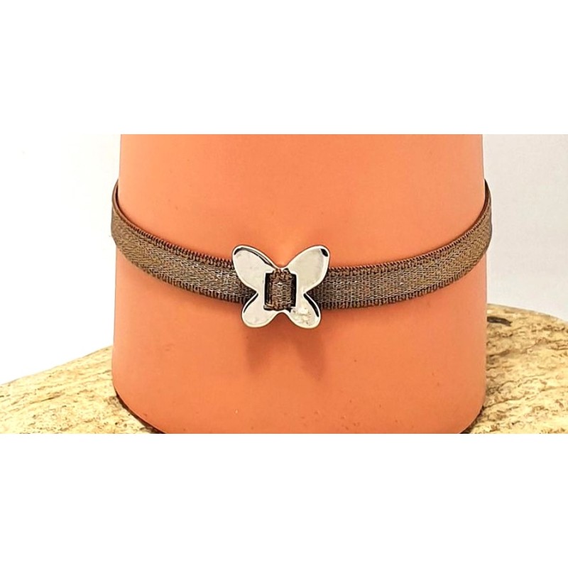 Bracelet élastique avec papillon en métal argenté