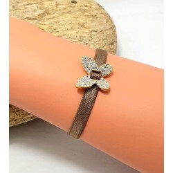 Bracelet élastique avec papillon doré en strass