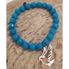 Bracelet turquoise en perles Millénium avec charm colombe – Lucky Team