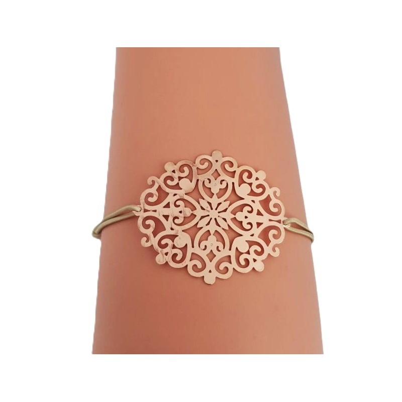 Bracelet élastique beige avec rosace en métal doré