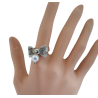 Bague fantaisie nœud papillon ajouré et perle